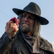 The Saint of Killers pulls out a tongue.